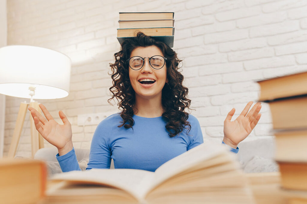 Girl balancing accounting supplements on her head